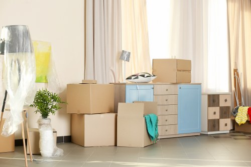Removal team planning a home move in a Bayswater street