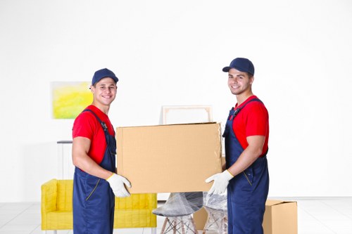 Furniture and boxes being loaded for removal truck hire