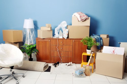 Furniture pick-up team handling large household items in Bayswater