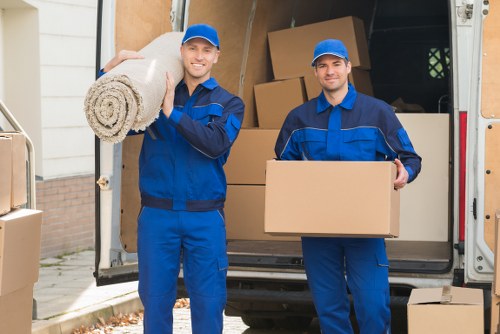 Protected furniture and trained movers handling items carefully