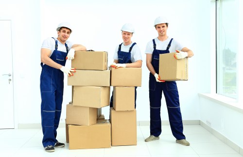 Removal team handling household furniture for a Bayswater move