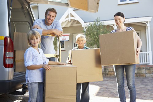 Packed boxes and furniture prepared for a Bayswater house move