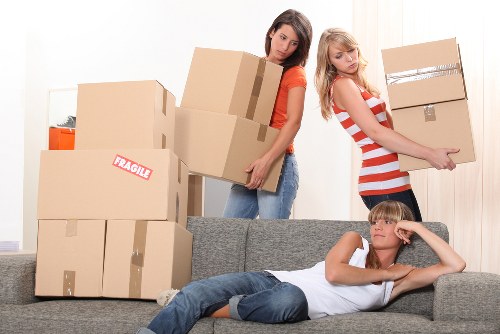 Preparation checklist and packed boxes for a flat move in Bayswater